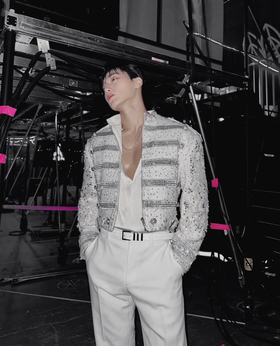 Strutting backstage in a dazzling sequined jacket, white ensemble, and bold belt, ready to steal the spotlight. 🎤