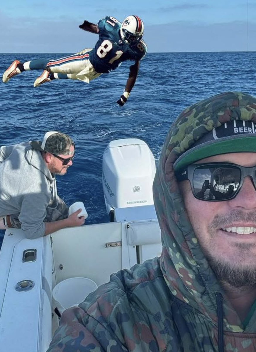 My brother sent me this. Someone asked “Can someone add a dolphin to the background?” 😂