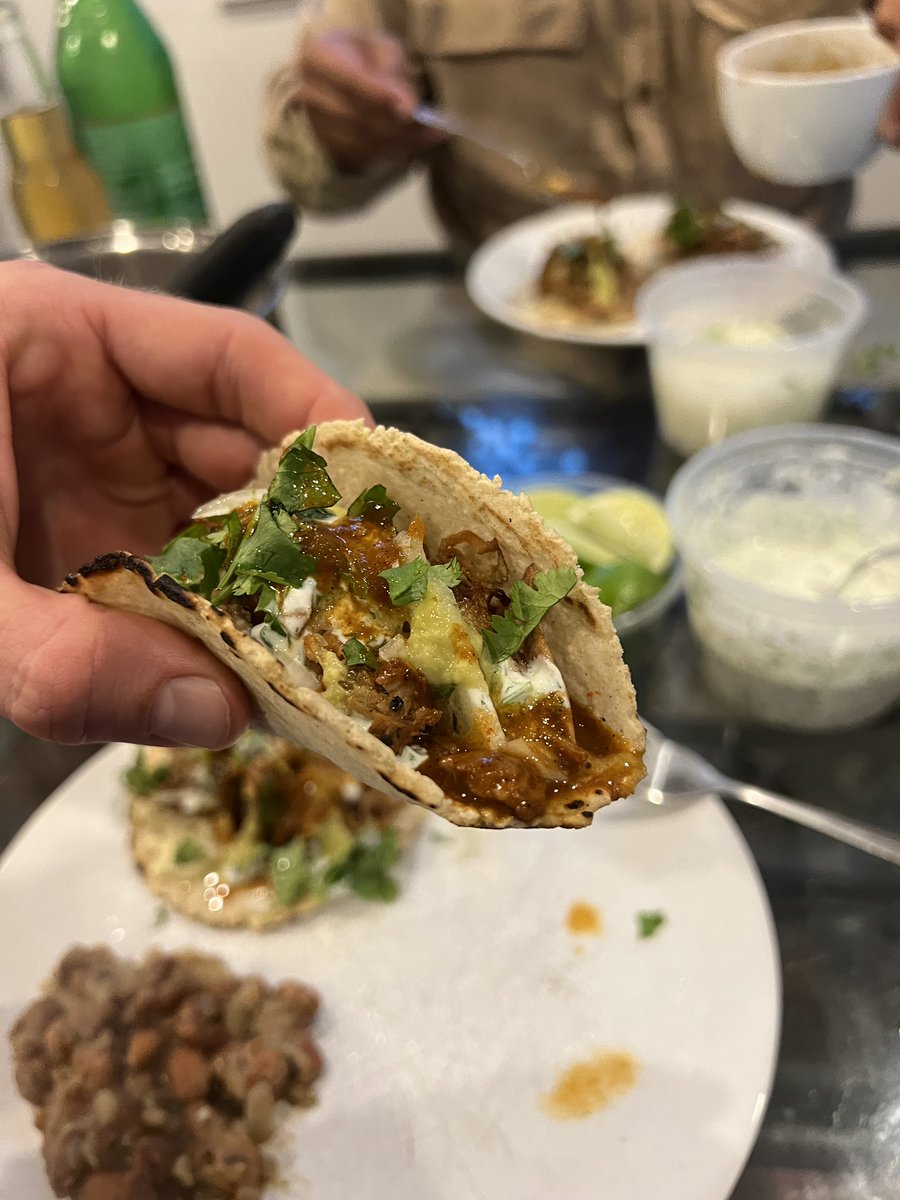 Tacos for dinner tonight. 

Homemade tortillas, melted jack cheese, Cobanero chiles, braised pork, cilantro lime crema, and a reduction of the braising liquid.