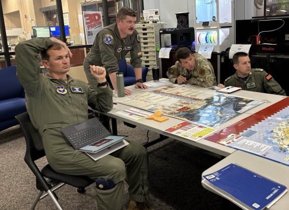 AirForceACSC's tweet photo. Day 1 of our capstone is complete for 10 wars, 29 joint task force teams, and 4 combatant command staffs engaged in an all-domain week-long campaign covering the Western Pacfic, Persian Gulf, and Eastern Europe. #theairpowerschool #ACSCAY25 #wargaming https://t.co/boqgbqCOUk