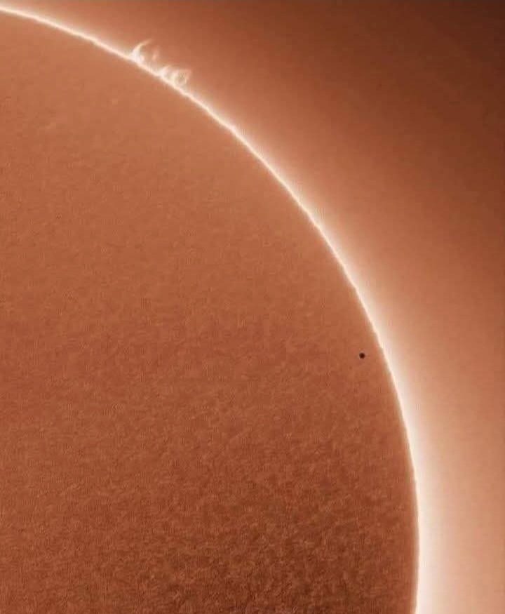 That small black dot in front of the sun, is Mercury!