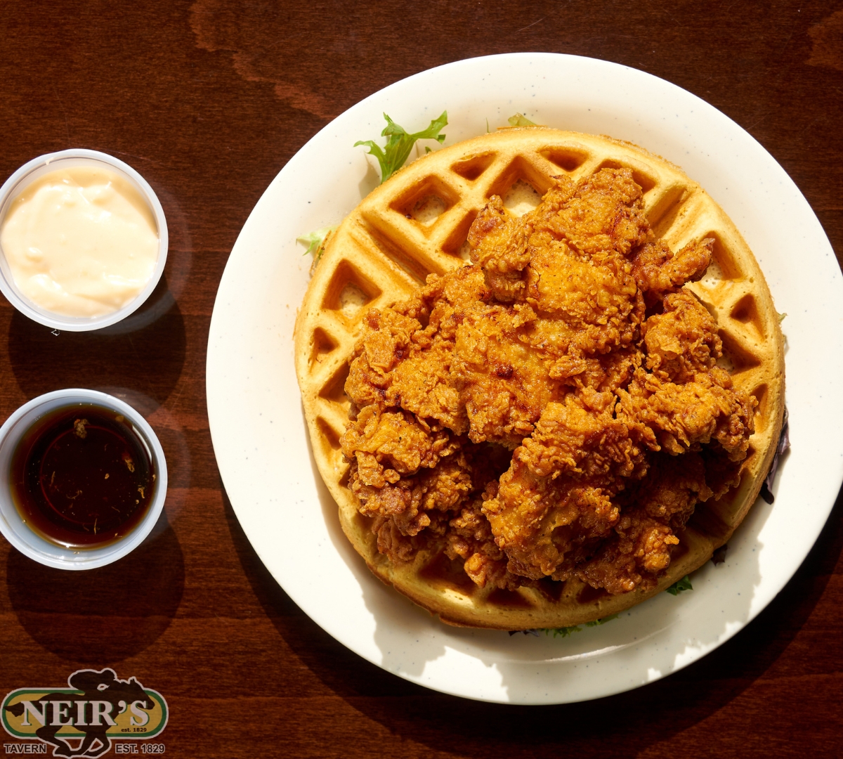Neirstavern's tweet image. Crispy fried chicken on a fluffy waffle—this is what dreams are made of 😍🔥 Drizzle the syrup, dip in that creamy sauce, and let the flavor party begin!

Tag your foodie buddy who needs to hit up Neir’s Tavern with you!

#NeirsForYears #ChickenAndWaffles #CrispyGoodness #NYCEats