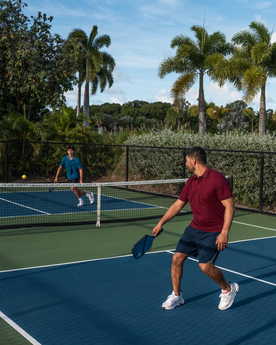 Sun’s out, paddles up. With four courts and palm trees swaying overhead, there’s nothing like a quick game to get your island day going. #fsnevis