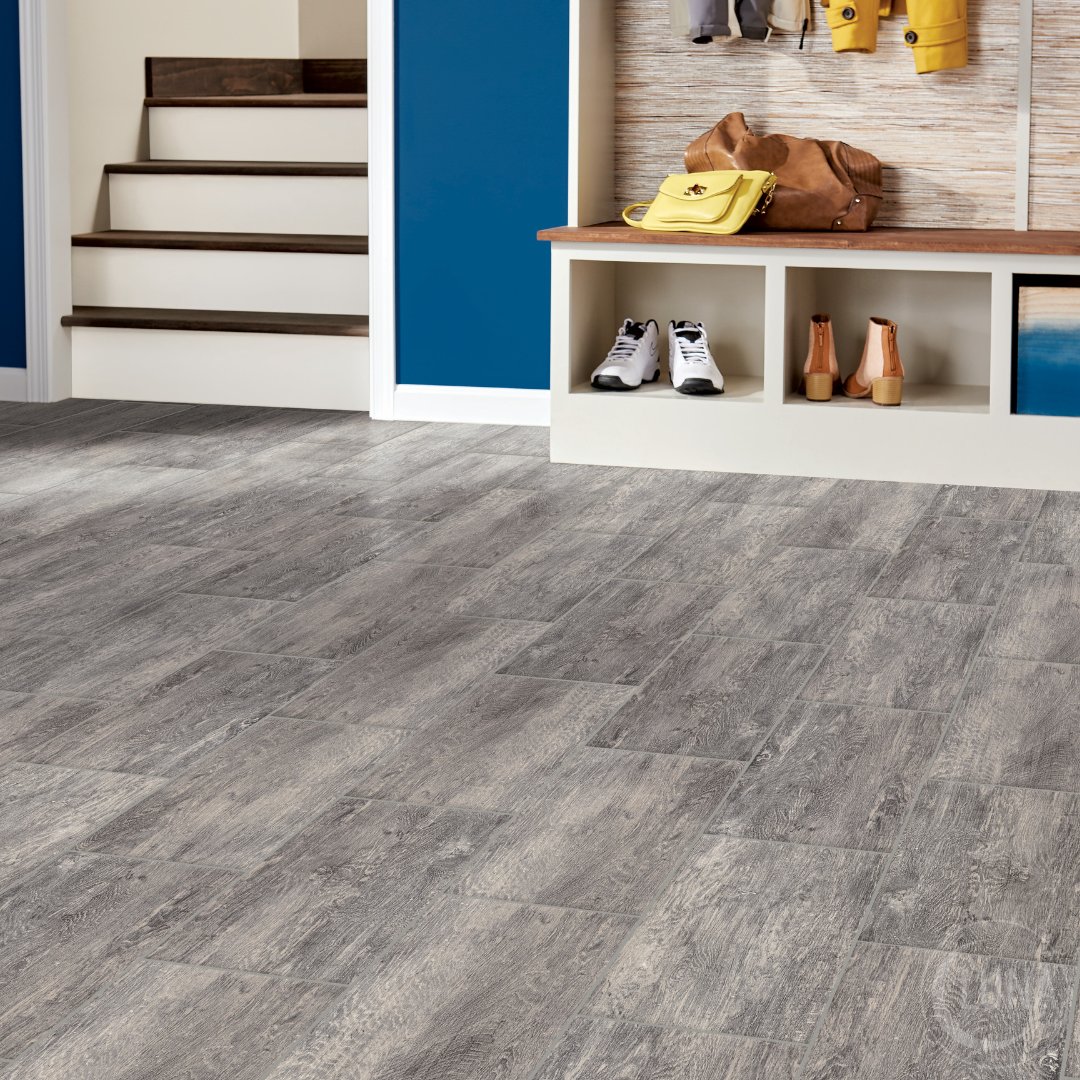 Vinyl tile is suited for areas of your home with high foot traffic. Made from engineered stone, vinyl tile has both the realistic look &amp; texture of genuine hardwood, for a fraction of the price.

FLOOR TYPE: Vinyl Tile
STYLE:  Windward
COLOR: City Street

bit.ly/4jAJN0E