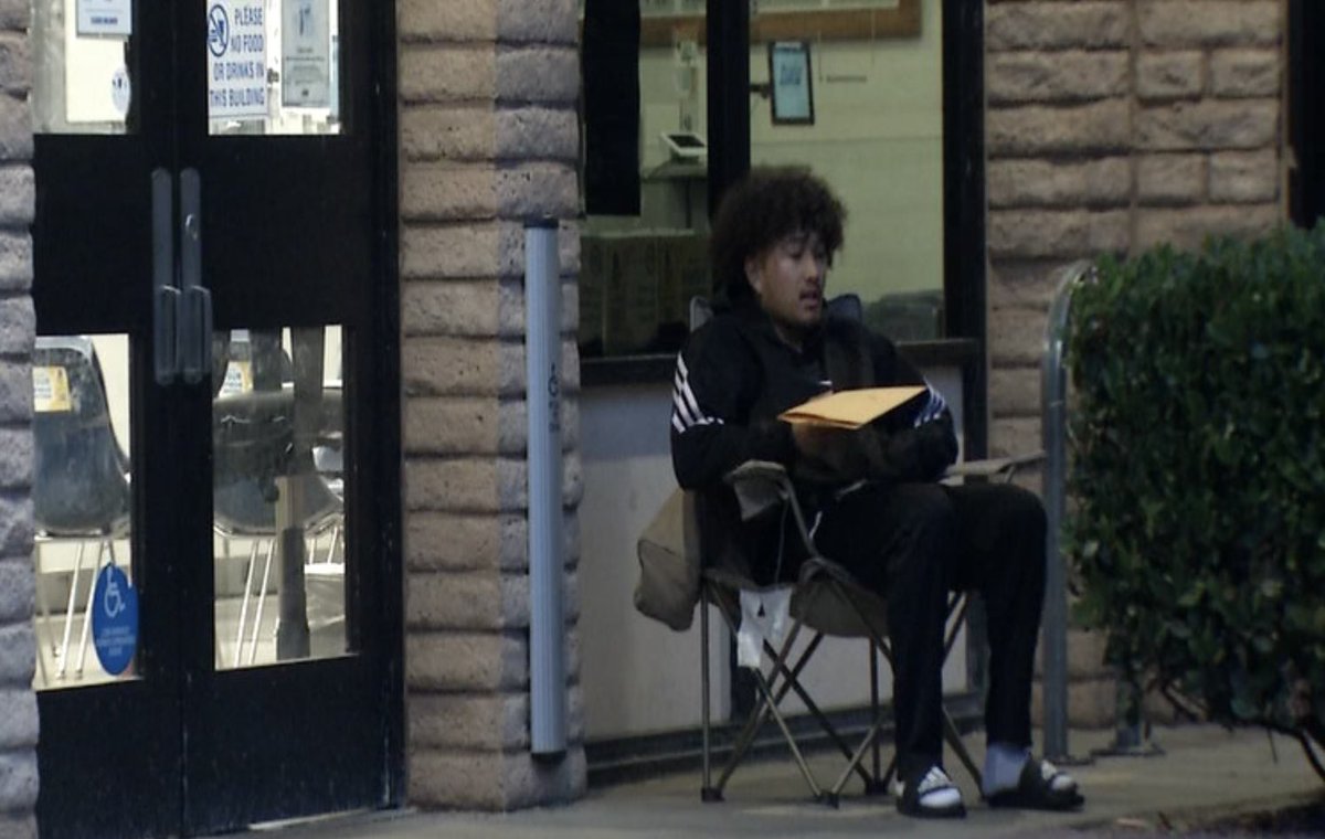 Anthony Carlos showed up at 6 AM and camped out with a lawn chair to be first in line at DMV for his REAL ID. Took him 3 hours to get in - as the last minute rush continues. <a href="/kron4news/">KRON4 News</a>