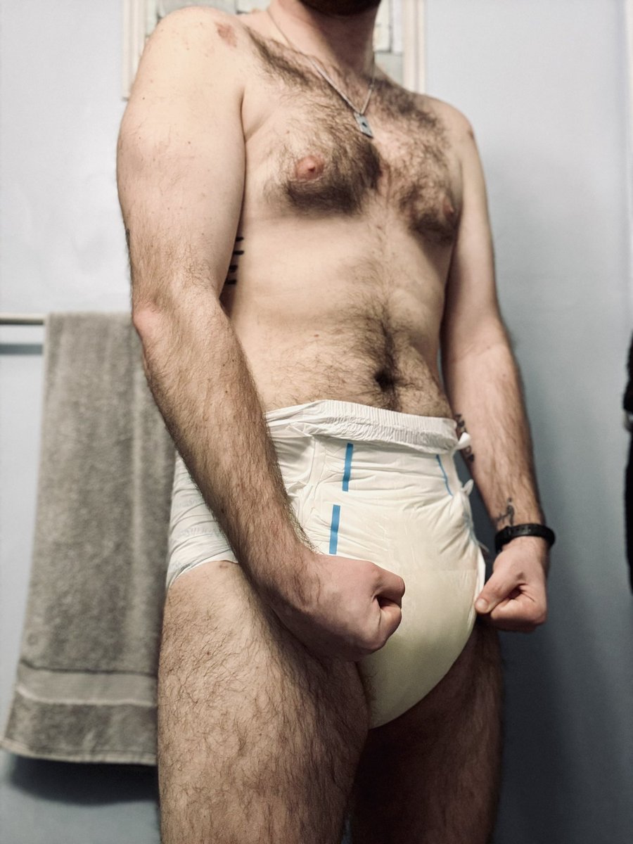 I know I look big and strong, but that doesn’t matter when I’m in this diaper, does it? You see right through me—just a needy, pathetic baby desperate for your approval. I flex for you, crawl for you, beg for you… because being your dumb, obedient toy is all I know.