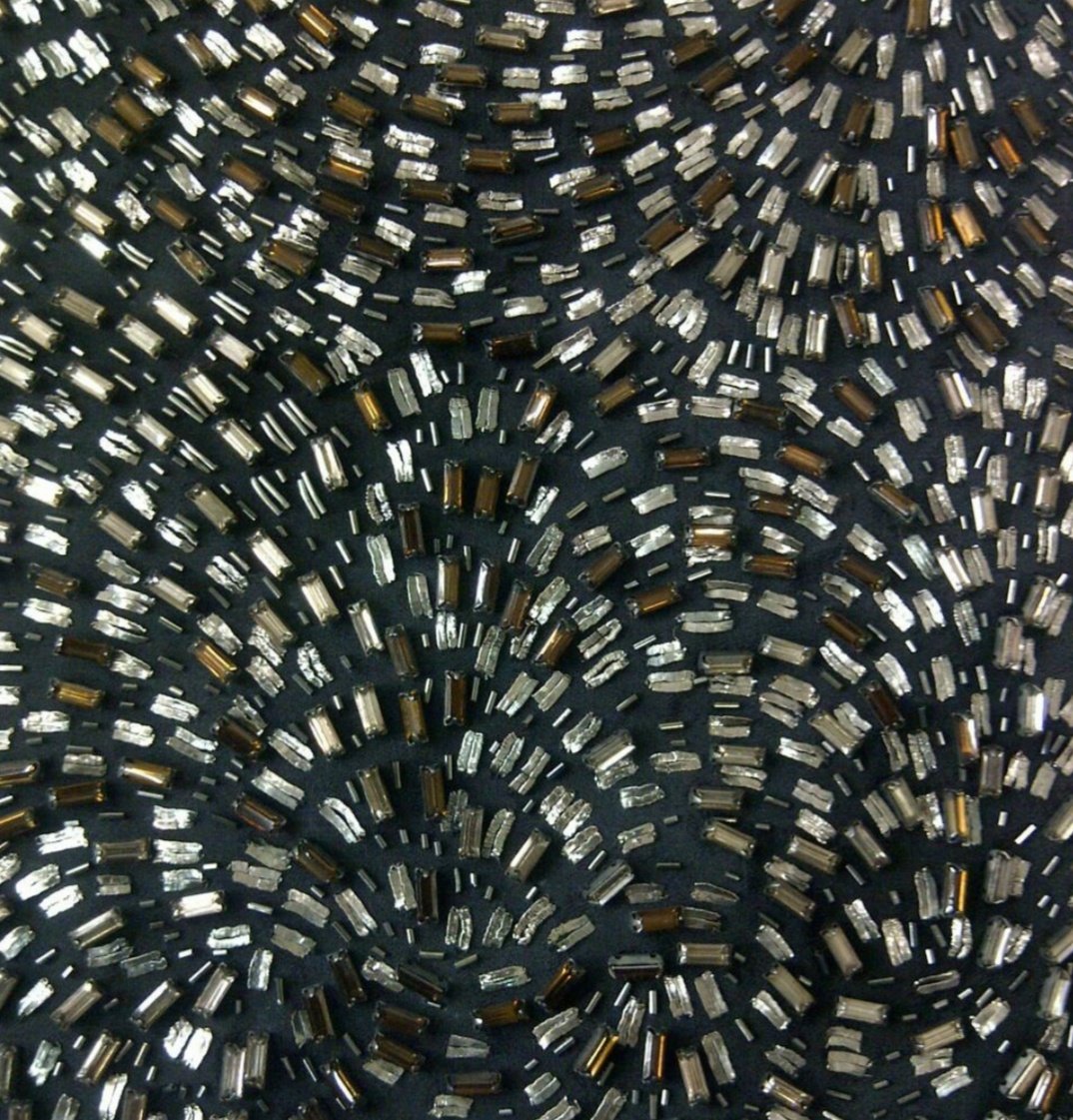 This stunning hand embroidery features a dynamic swirl pattern in high-shine silver on a dark base—ideal for luxury couture, eveningwear &amp; accessories.
Timeless craftsmanship, elegant texture.

Contact: info@sadulbadul.com | +91 91363 04295
sadulbadul.com
#SadulBadul