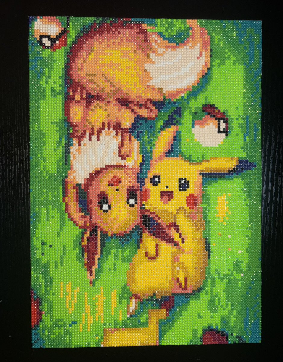 Finally finished my Eevee &amp; Pikachu diamond art took me a little less than 2 weeks working on it pretty consistently a couple hours a day. Thinking of selling it not sure if I should include it framed already or not. I guess it depends on if anybody’s interested in purchasing it.