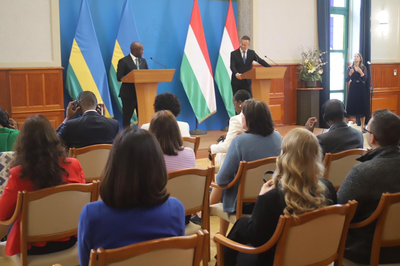 Minister Nduhungirehe speaking at a press conference in Hungary