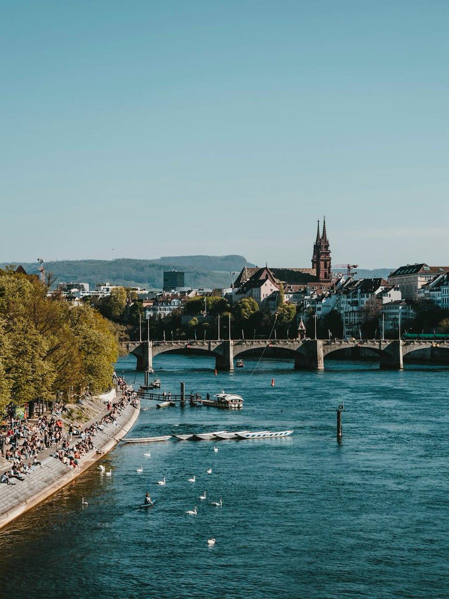Basel is buzzing 🇨🇭 <a href="/Eurovision/">Eurovision Song Contest</a> is here and the vibe is electric 🎤
📍 Basel, Switzerland 
📸 Claudio Schwarz on Unsplash
#Eurovision #Eurovision2025 #Basel #Switzerland #Rhine #river #cityscape #architecture #travel #tourism