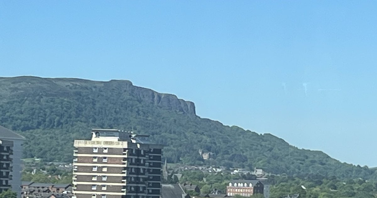Sunshine days in Belfast: City Hall, St Anne’s Cathedral, St Patricks and Carlisle Memorial while Napoleon sleeps on Cave Hill. Views from <a href="/Ulster/">Ulster</a> Uni