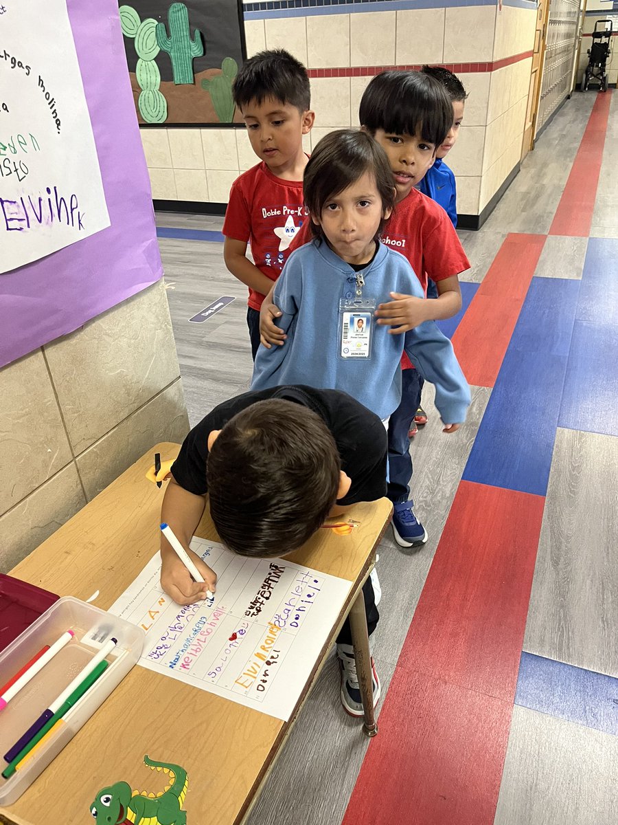 Reporting to duty! Dobie stars lining up to sign their name and start their day! <a href="/KHprincipal/">Kirstyn Hart</a> #risdbetheone