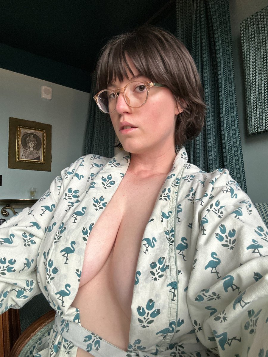Is there anything better than a hotel robe with flamingos on it?