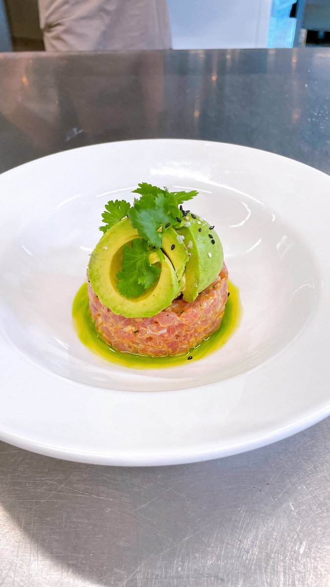 Tuna tartare with scoop of avocado and sesame