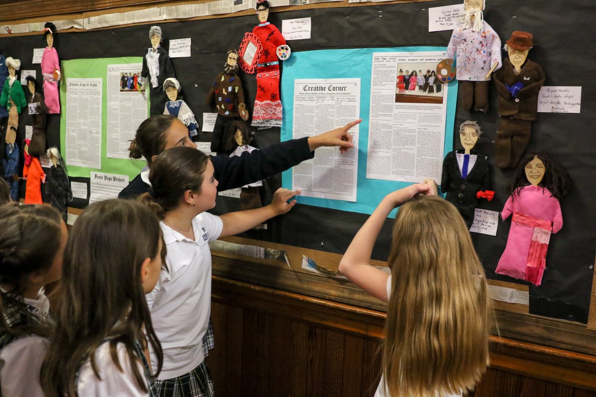Fifth graders were paired with third graders last week to show off news articles they wrote about historic news events. The conversations let students in each grade share what they learned while becoming experts on a world-changing news event, for the fifth grade, or on an