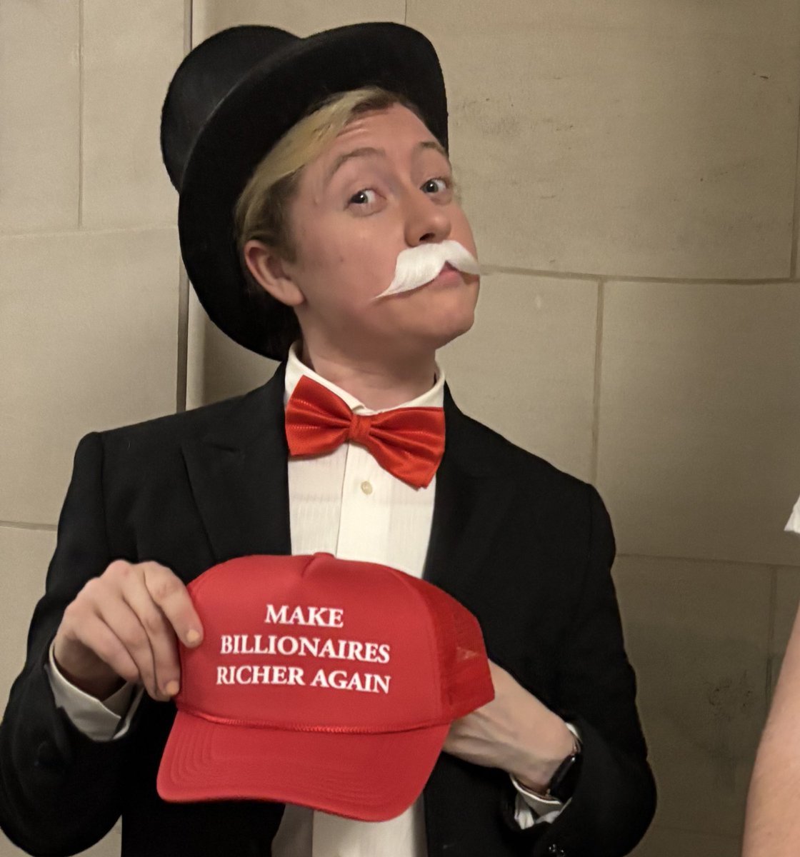 Rich Uncle Pennybags stalking the halls outside the tax committee room where Republicans are starting work on the tax part of the BBB.