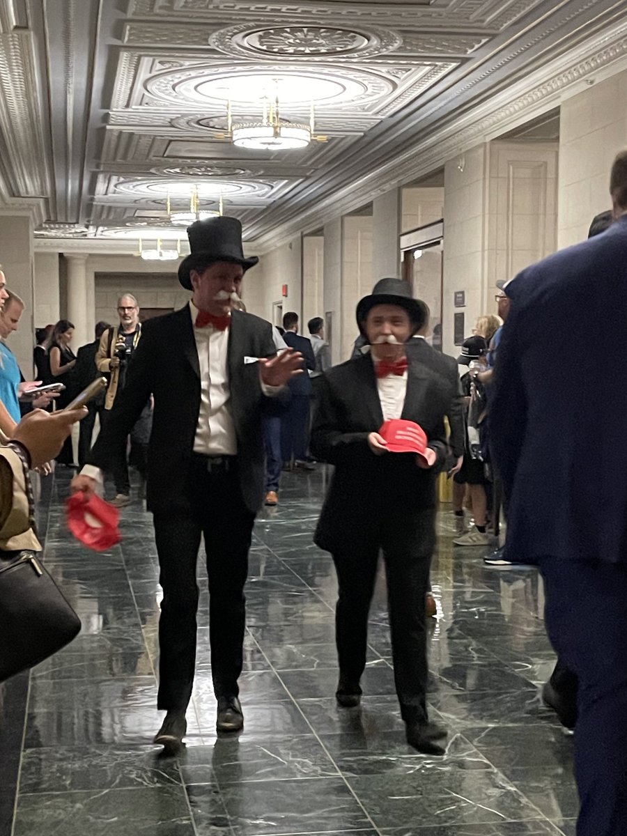 Outside the House Ways and Means room, where the committee will soon start marking up the tax portion of reconciliation: people dressed up as Mr. Monopoly. 

The red hats say “Make Billionaires Richer Again.”