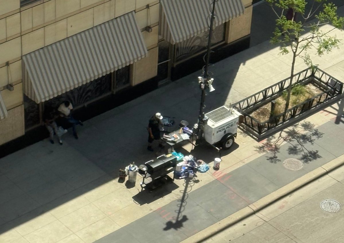 Submitted from downtown Minneapolis: A police camera was previously set up at 8th and Hennepin as deterrence to drug dealers. Welp, they are not deterred and have now set up a BBQ enterprise under the safety of the police cam.
h/t <a href="/CWMadel/">Chris Madel</a> 
cc: <a href="/MplsPDChief/">Minneapolis Police Chief Brian O'Hara</a> <a href="/MinneapolisPD/">Minneapolis Police</a> 🙄