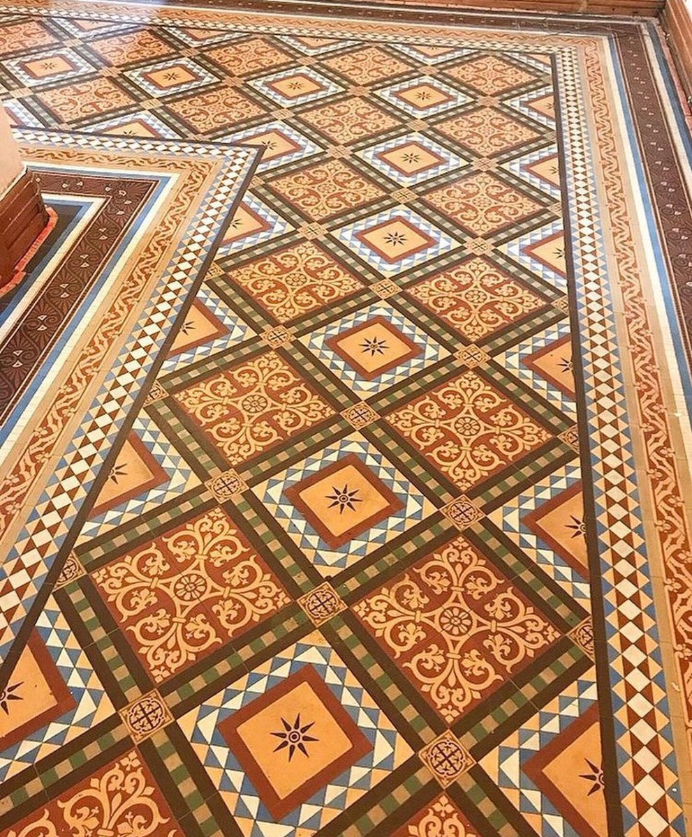 Imagine ripping up an old hallway carpet a few weeks after moving into your house and revealing this incredible original floor hidden underneath.