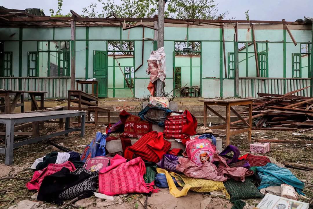TheChindwin's tweet photo. Parents, families of the victims and villagers have conducted burial rites for 22 individuals of which 20 were school going children and the other two were teachers - all of who were brutally killed when an airstrike carried out by the junta regime yesterday targeted a school in the village. 

Current reports reveal that among the casualties are 20 children and 2 teachers, with more than 60 people left injured in the devastating aftermath of the bombing in Utthingkuan village.

The junta regime's willingness to perpetrate such acts of violence against civilians is both unprecedented and alarming, particularly in light of the regime leader's attendance at a victory parade in Russia hosted by President Putin.

Photo/CJ