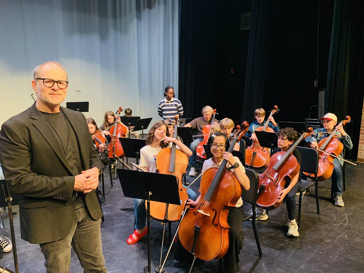 Tuning up for the 7th grade orchestra Pops &amp; Popsicles Concert..