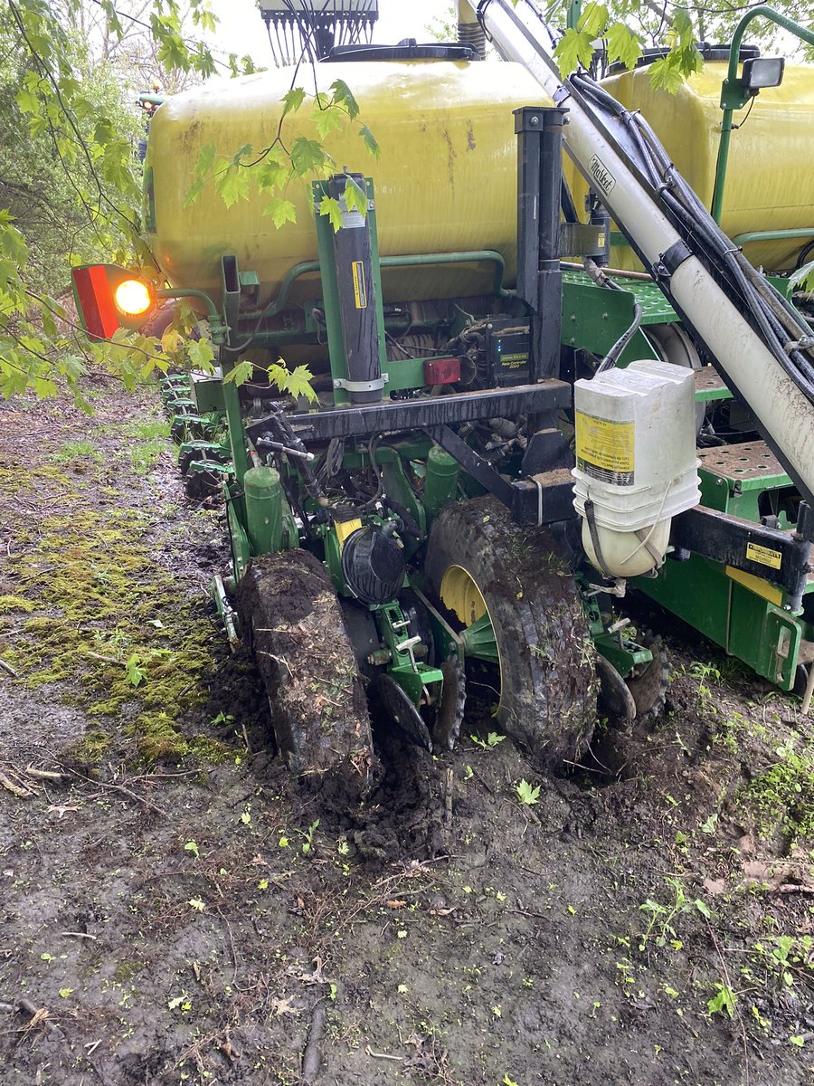 First time sinking in black muck on a driveway, these long planters make a challenge on some driveways. thankful of our 744k loader that can pick the whole planter up and move it