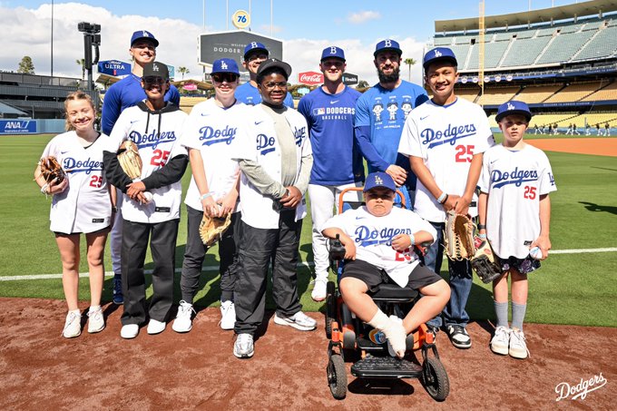 A photo of the seven children from Make A Wish America with Jack Dreyer, Anthony Banda, Ben Casparius and Tony Gonsolin.