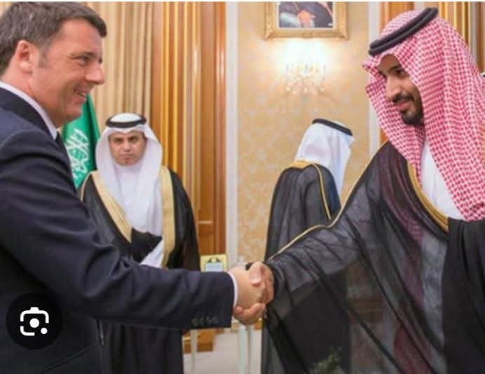 Vi ricordate boccaloni?
Questo a cui Renzi stringe la mano è l'assassino con le mani sporche di sangue, adesso invece, improvvisamente è saltato agli onori della cronaca, osannato e riverito da tutti.
