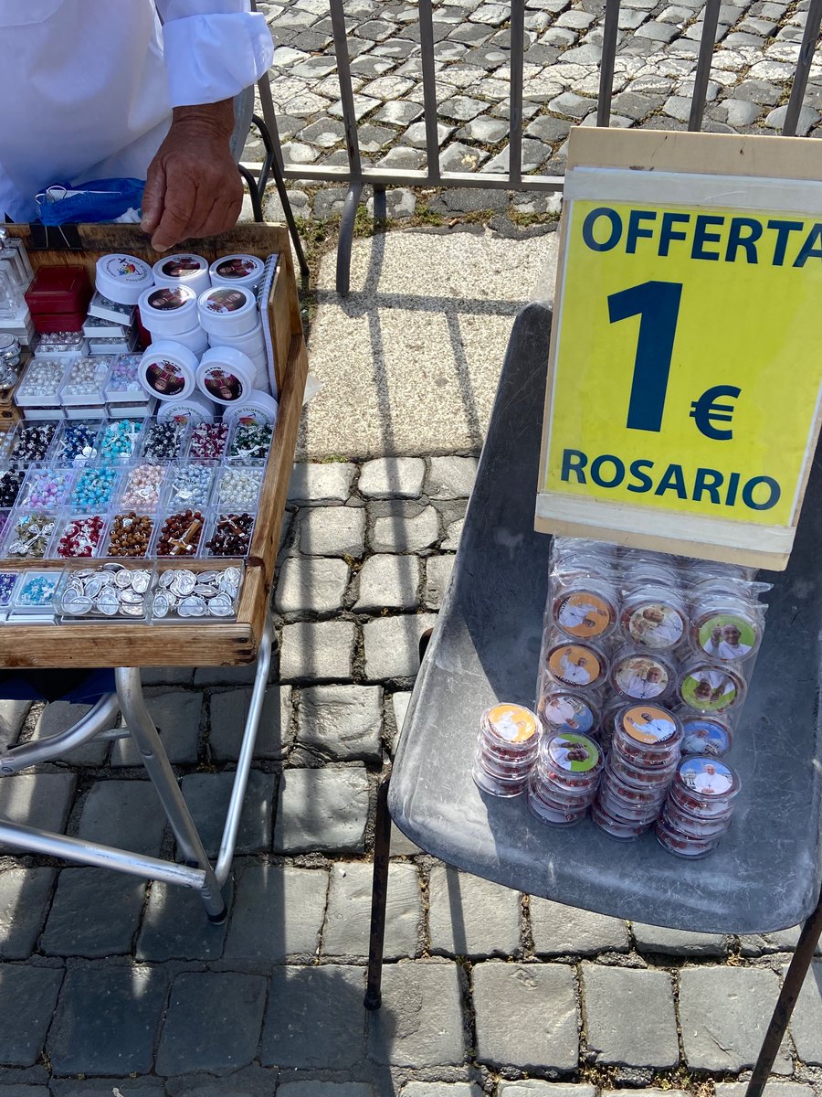 McLellan_Js's tweet image. First Pope Leo merch I’ve seen around the Vatican. Pope Francis rosaries “on sale” for one Euro.