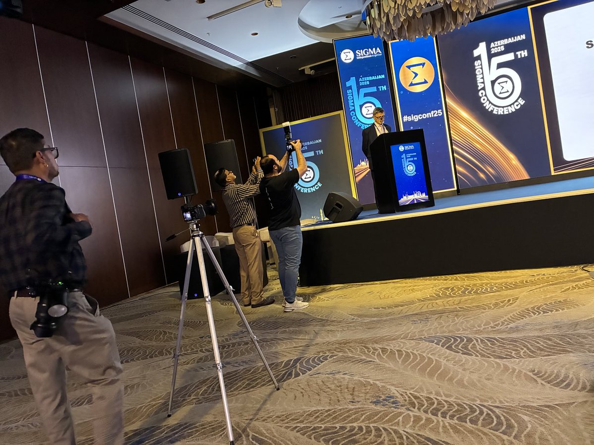 The photographers flock around Sigma chief Bharat Shah as he closes the Baku conference. All coverage at pharmacymagazine.co.uk #sigconf25 signing off