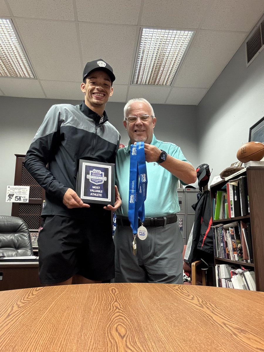 Look who stopped up to the office this morning to show off his gold and silver metal from the PSAC track championships and also his most valuable athlete plaque. Words cannot express how much this young man has met through the football program and me personally.