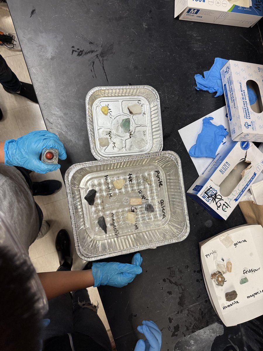 Our 6th grade scientists are testing minerals.