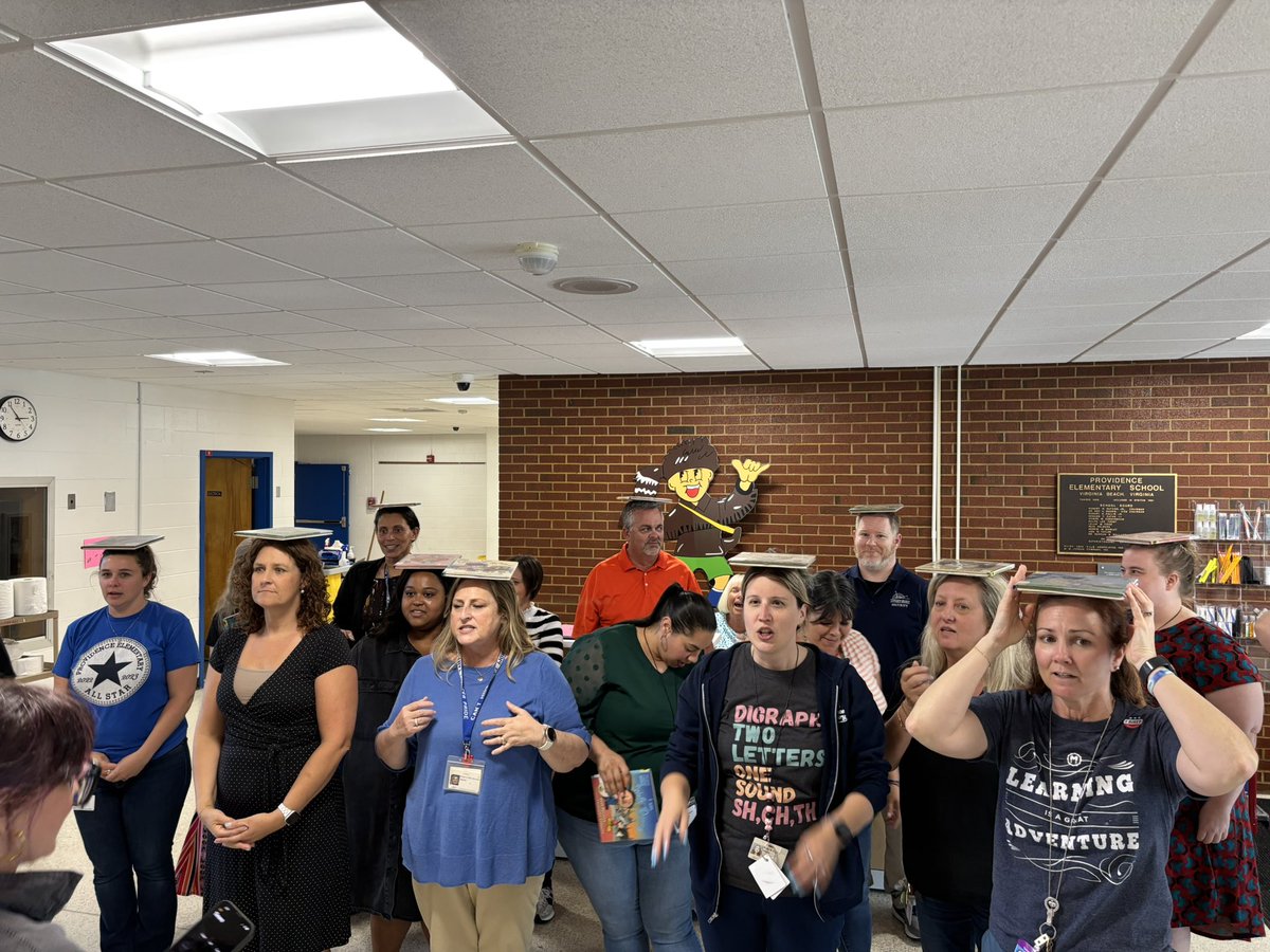 It’s Wednesday, and you know what that means—Minute to Win It time! Today’s challenge: book balancing down the hallway in under a minute. A little bumping (friendly, of course), a lot of laughs, and three lightning-fast winners! <a href="/vbschools/">VBSchools</a>
