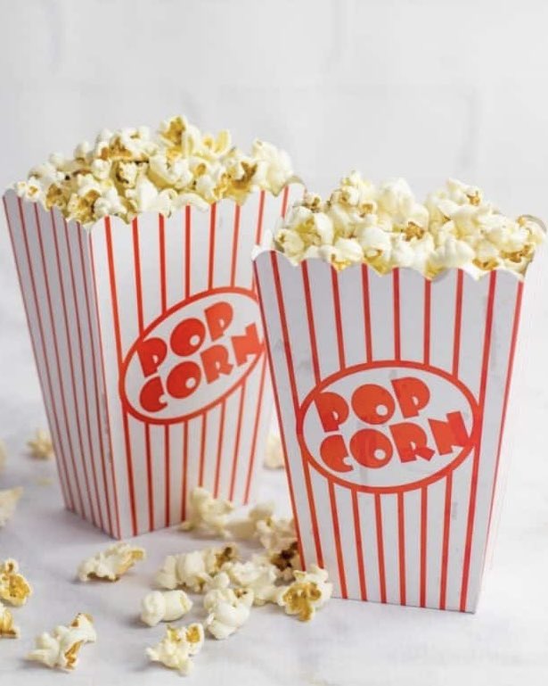 Baby Keem has a popcorn kernel stuck in between his teeth that he can feel with his tongue but not his finger