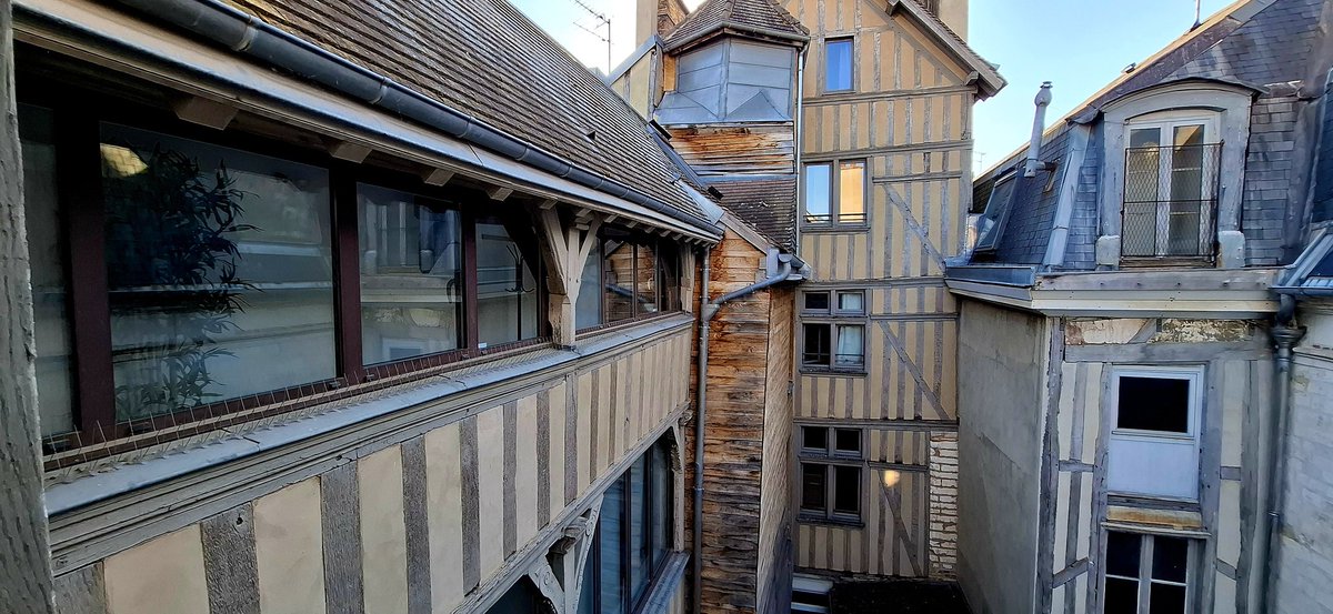 nicostjean's tweet photo. View from our apartment in Troyes, including the long solarium to the left. Why don't we have more of these up north? https://t.co/rFlTpxePmP