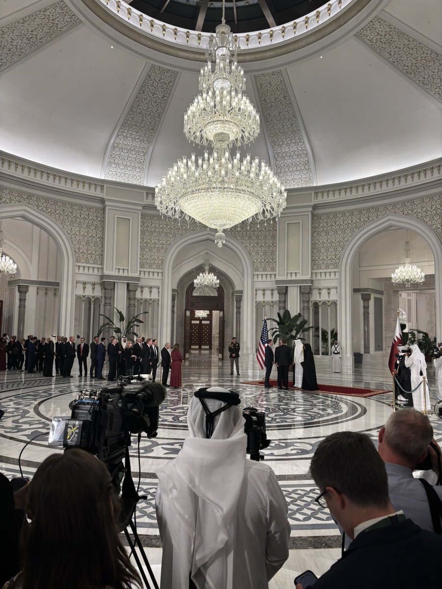President Trump and the Qatar emir greet  Elon Musk ahead of State Dinner at Lusail Palace.