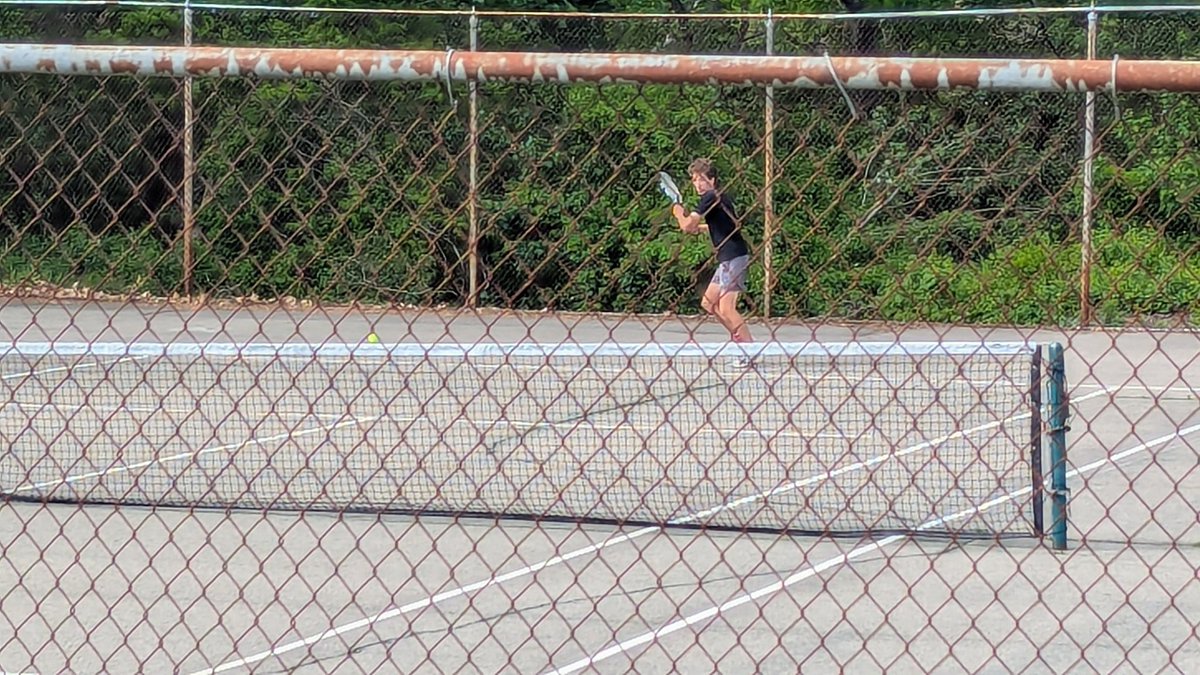 Warwick boys tennis warming up for their match with Scituate. Maynard brothers in action on Senior Day!