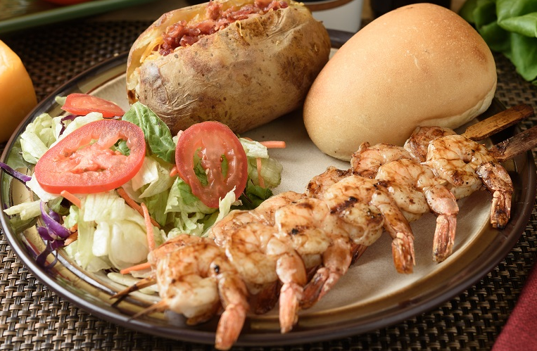 Stop staring-and start ordering. Online ordering is available at steakout.com #wedeliver #grilledshrimpdinner