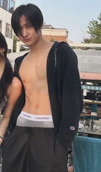 the sweat patch around his crotch-