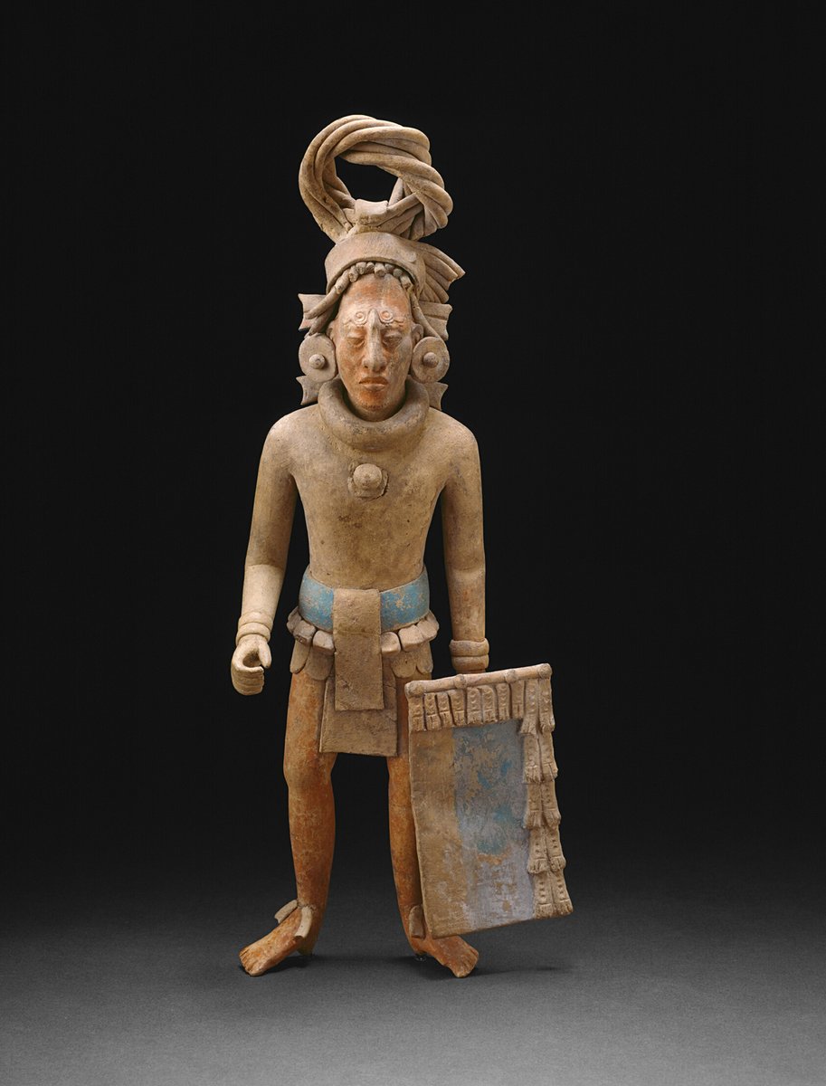 Figure of a Standing Warrior, terracotta, Late Classic Maya, Jaina, Campeche or Yucatán, Mexico, AD 650–800. Collection: The Art Institute of Chicago. 

This terracotta figure represents a Maya warrior standing with a rectangular shield in one hand, originally accompanied by a