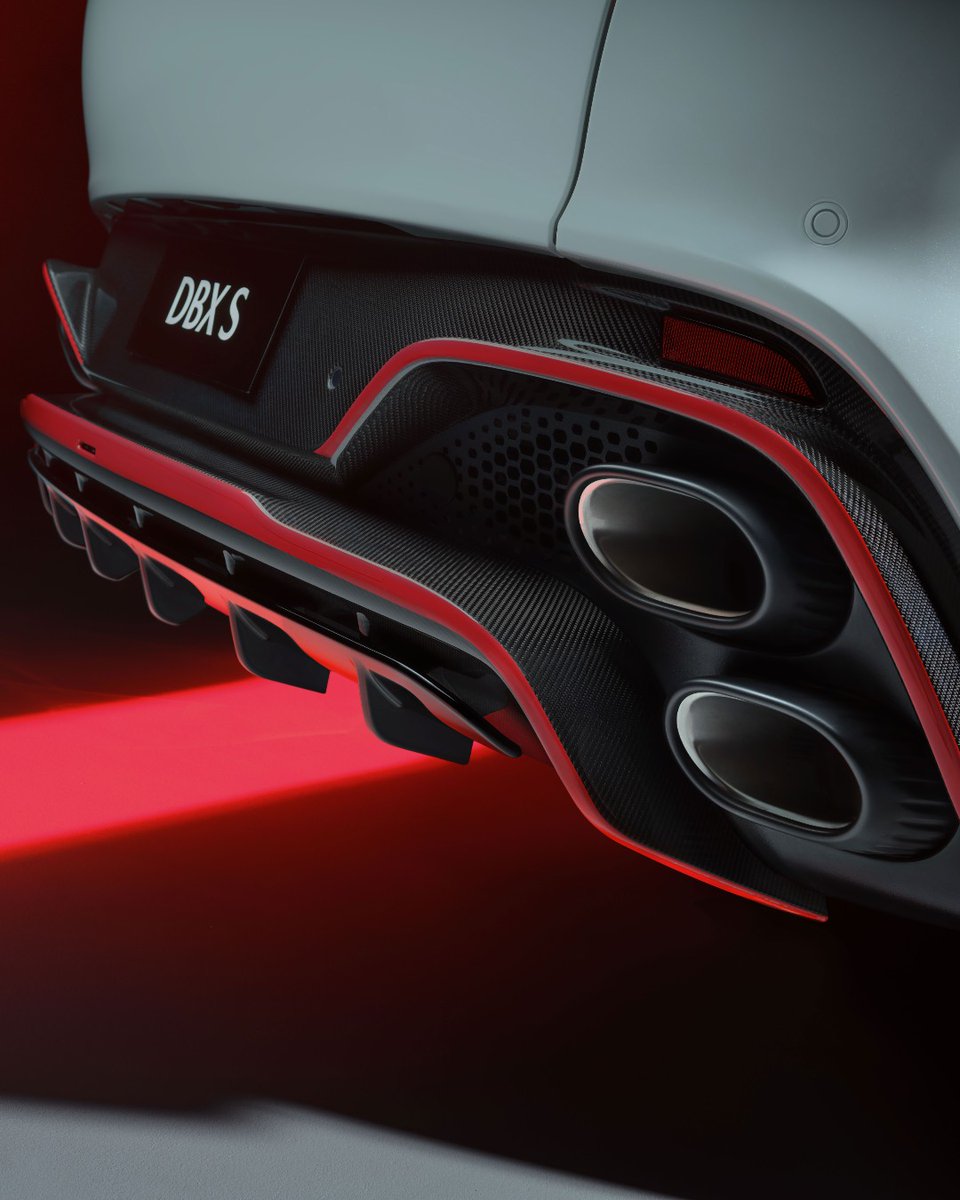 AstonManchester's tweet photo. Lightweight honeycomb grille. Aggressive front splitter and diffuser. New quad stacked exhausts. V8 at full voice. A more brutal, assertive character.

DBX S.

#AstonMartinManchester #AstonMartin #DBXS #POWERDRIVEN https://t.co/2kXrwozRa9