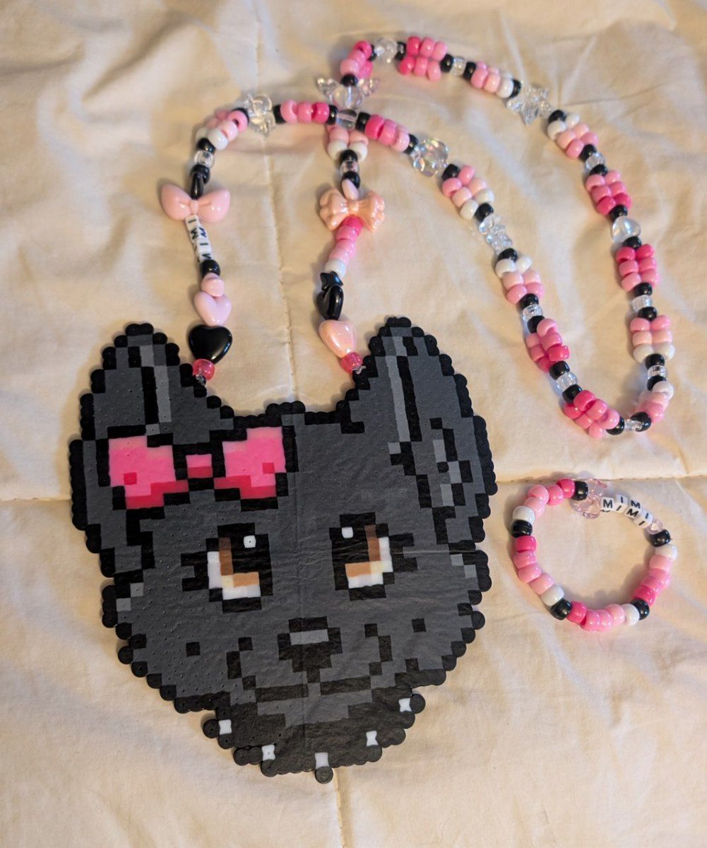 Perler badge for <a href="/MimiADShep/">Mimi</a> 🌈