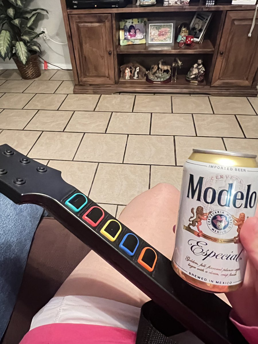 menabloo's tweet photo. reptilia on guitar hero and beer https://t.co/LGfFTfkcEQ