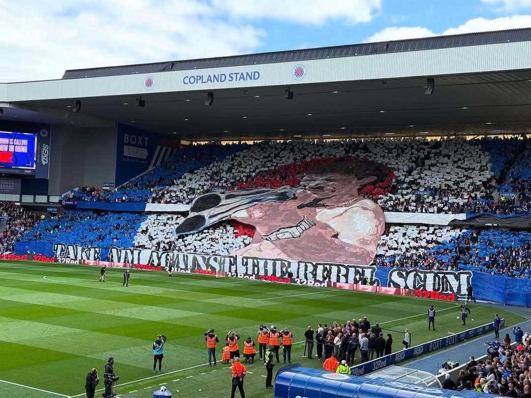 FBAwayDays's tweet photo. Rangers tifo for their game against Celtic today. 

“Take aim against the rebel scum” 

🔴⚪️🔵 https://t.co/HIr3o12Zmk