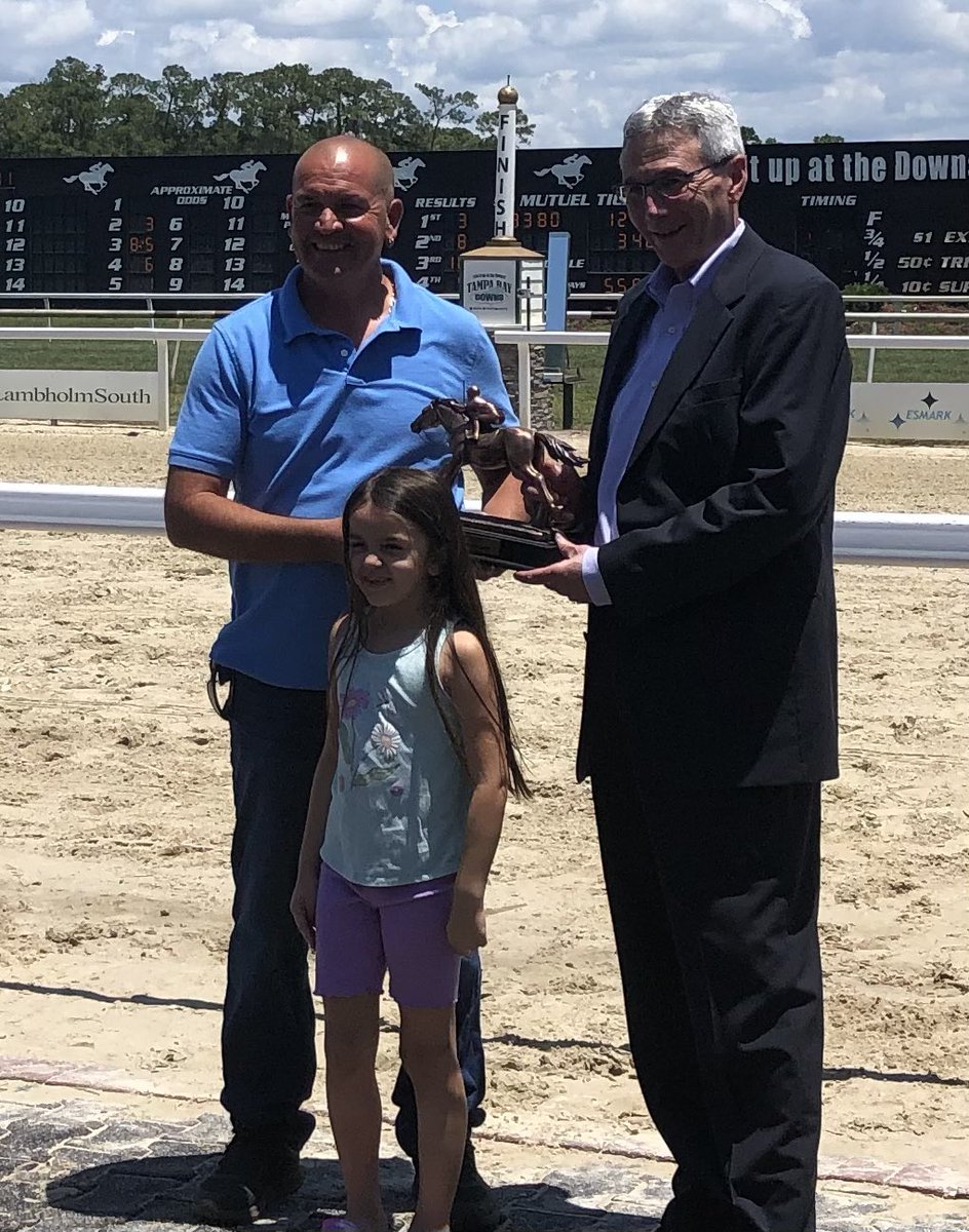 Tampa Bay Downs Official Account (@tampabaydownsfl) on Twitter photo Juan Arriagada, left, with his daughter Tezza, accepts his third consecutive Leading Owner trophy from Peter Berube, the track’s Vice President & General Manager. Arriagada has won 40 races this season as an owner and is second in the trainer standings with 42 victories. Juan Arriagada, left, with his daughter Tezza, accepts his third consecutive Leading Owner trophy from Peter Berube, the track’s Vice President & General Manager. Arriagada has won 40 races this season as an owner and is second in the trainer standings with 42 victories.