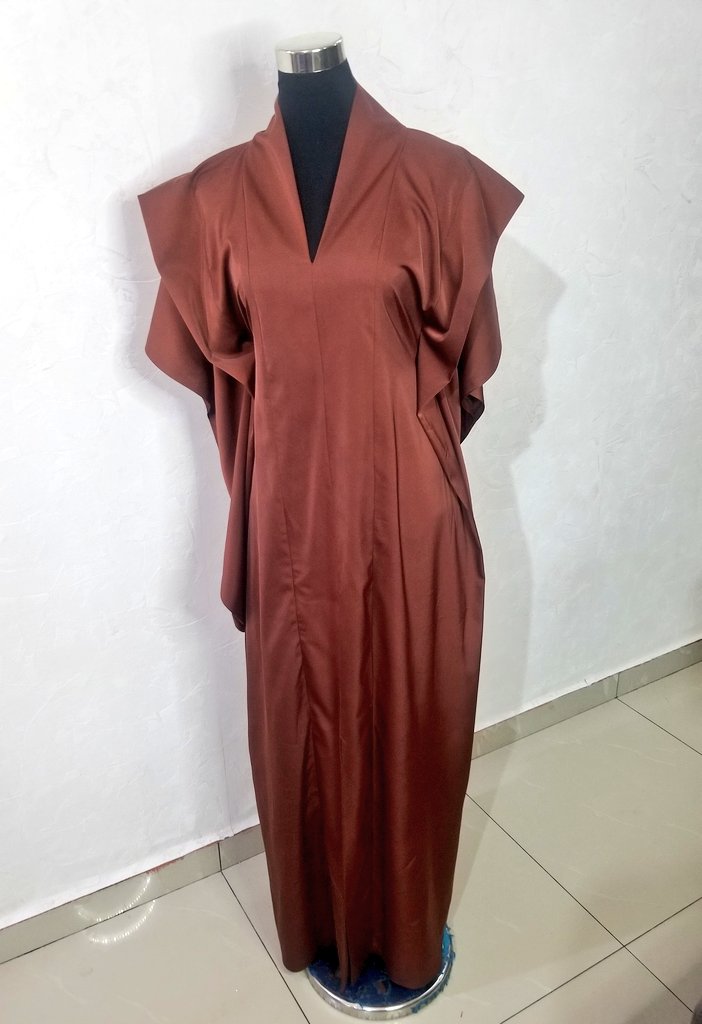 Coffee brown bubu dress giving us the rich aunty vibe.. 
available in all sizes
Price : 30k.