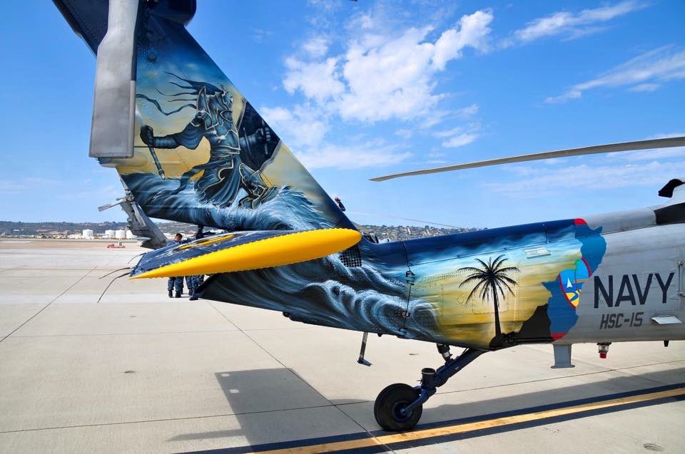 ShayneB52's tweet photo. Flashback to 2015 when I painted this MH-60S for HSC-25 Island Knights in Guam. Lots of color and a fun design I came up with. This bird is also in a movie on Netflix Operation Christmas Drop-it lives forever! #ilovetopaint #ipaintforfree I am #flygirlpainter ๐บ๐ธ๐บ๐ธ๐บ๐ธ https://t.co/dNTroHYdCN