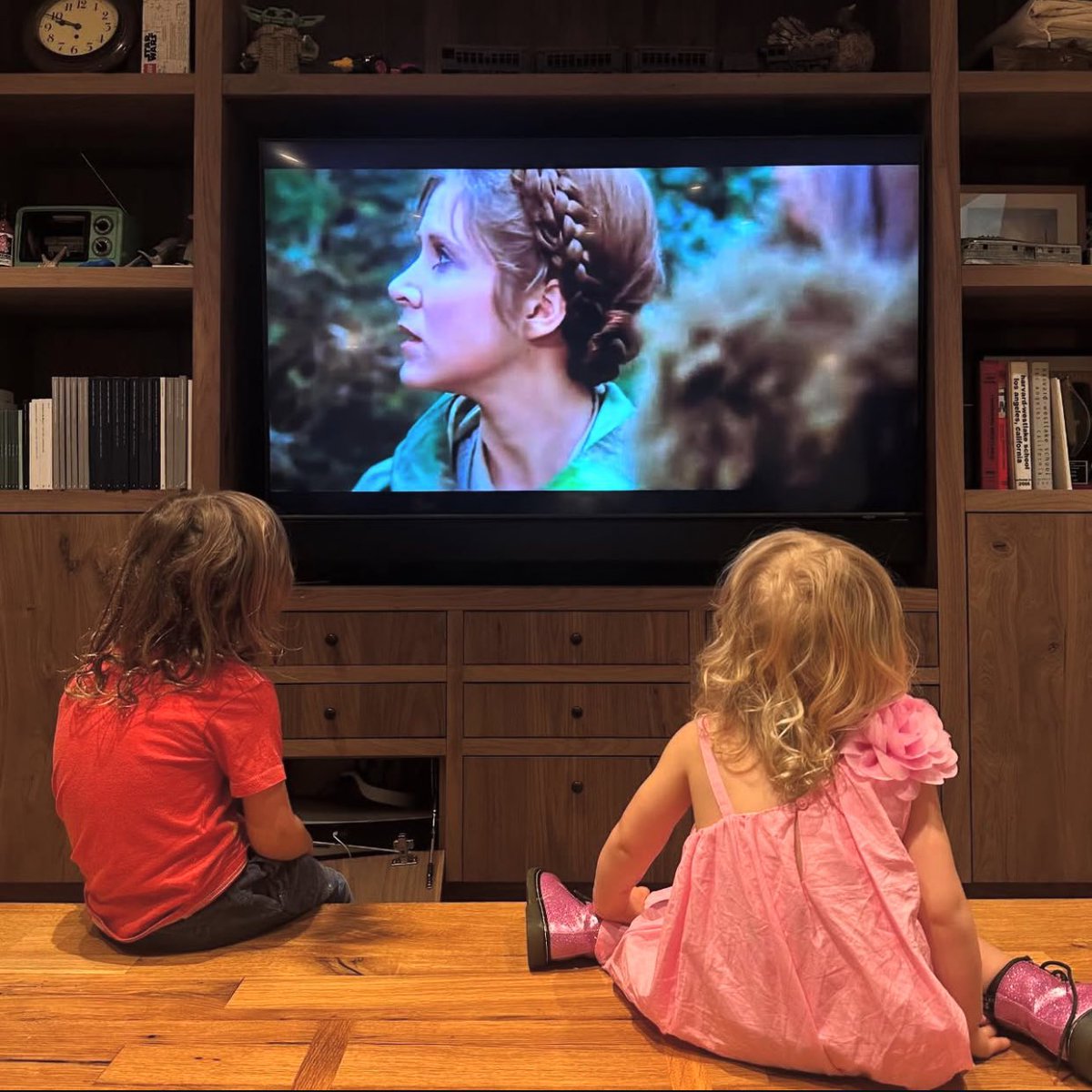 Carrie Fisher’s daughter, Billie Lourd, has shared a photo of her children watching Leia in ‘RETURN OF THE JEDI’ on May the 4th.