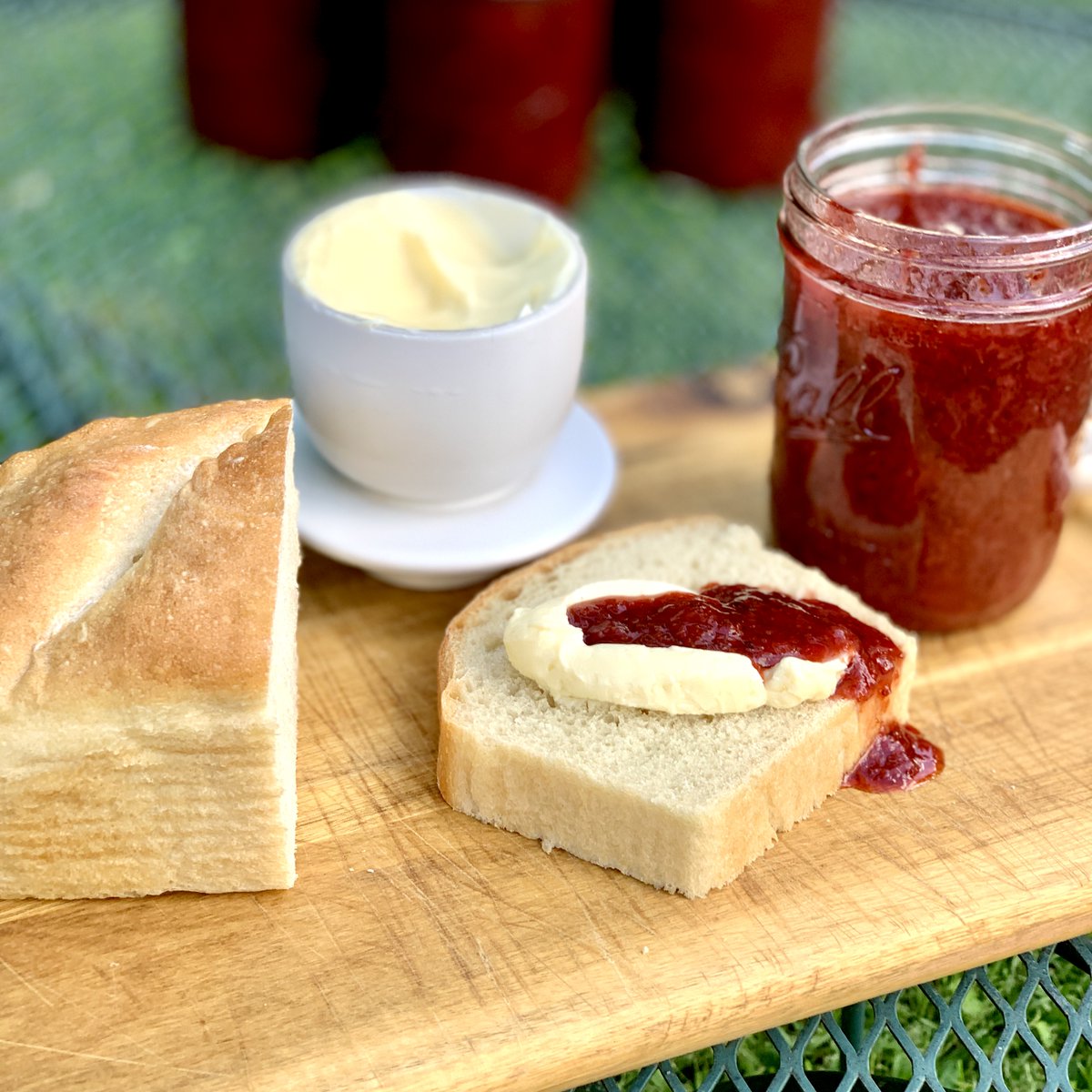 Homemade sourdough, good butter, and fresh strawberry preserves. That's all I know on Earth, and all I need to know. Spring strawberries are in and I'm having a ball, friends.