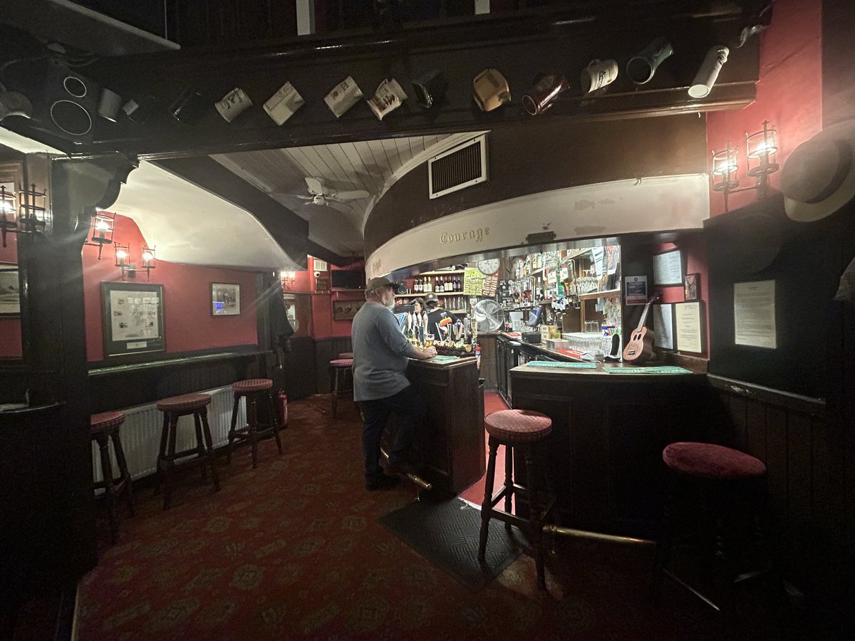 PubsSaving's tweet photo. The Cockpit, 7 St Andrew’s Hill #EC4 Grade II listed. Rebuilt c1860. Interior lighting from the leaded windows & curved door draw you into a small interior, curved bar. High ceiling, upper gallery with old ceramic beer jugs. Harvey’s Sussex Best on cask. #gradetwolisted #pub https://t.co/O0ro4XgrDV
